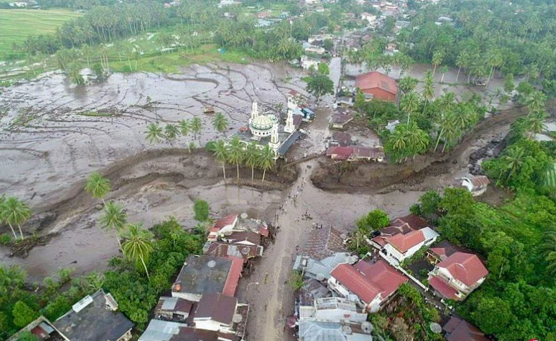 Flash floods and cold lava flows in western Indonesia killed 34 people